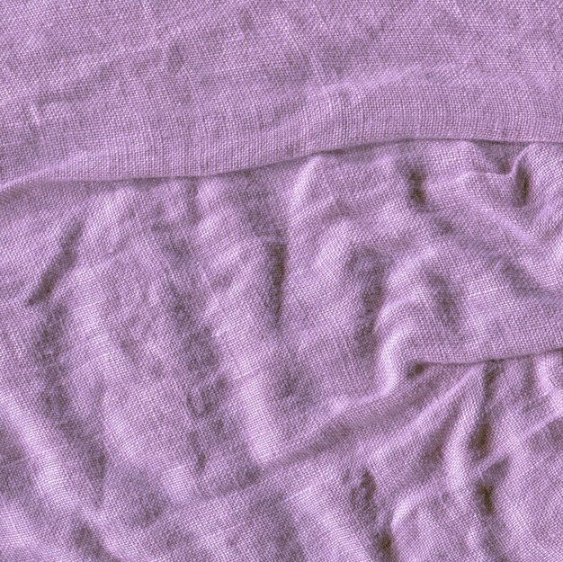 Texture of linen purple fabric Purple fabric background