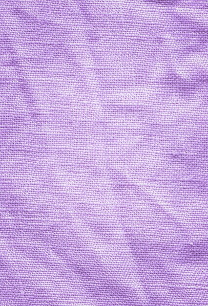 Texture of linen purple fabric