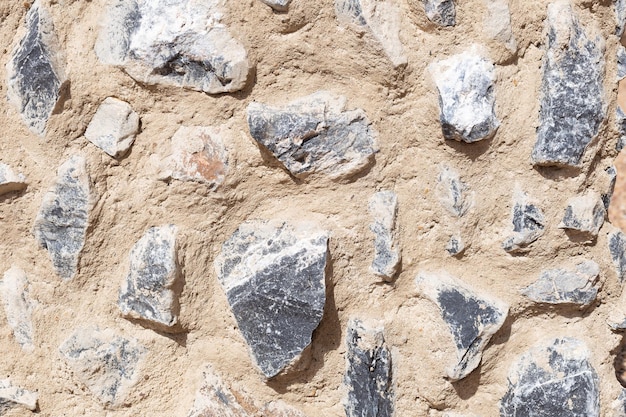 Texture made of large stones in mortar Horizontal