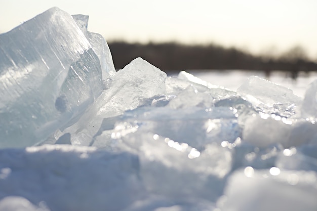 Texture of melting ice on a spring day under the sun.