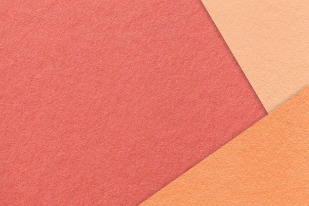 写真 クラフトの赤い紙の背景の質感 桃色のフズとサンゴの境界 ヴィンテージ・マルーン・カードボード