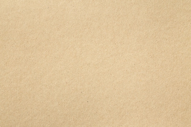 Текстура старой коричневой бумаги для фона, закройте переработанный картон