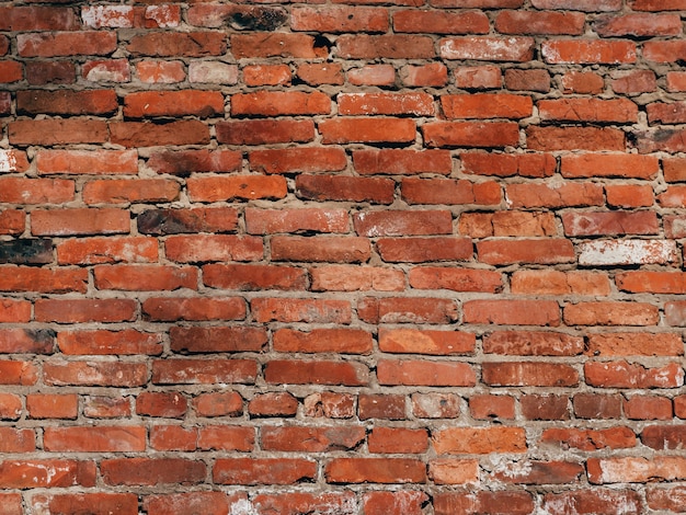 Texture of old brick wall is red