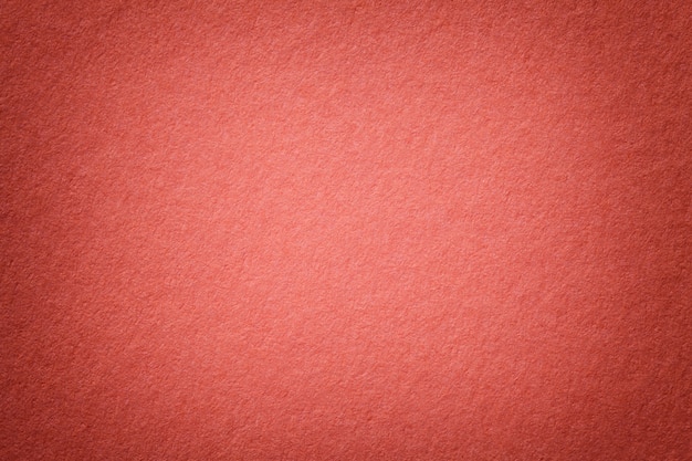 Photo texture of old bright red paper background