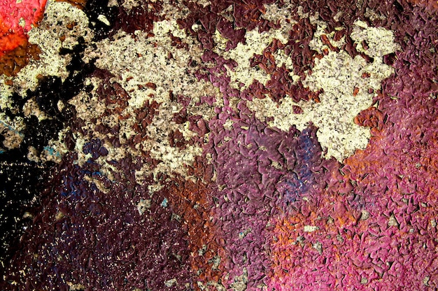 Foto texture di vecchia vernice bordeaux su una superficie di cemento