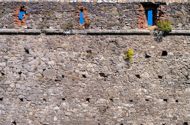 Texture of an old cobblestone wall