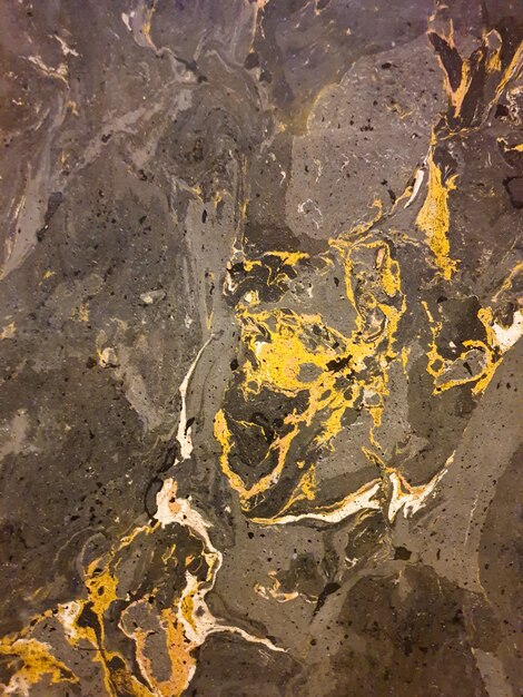 Texture of an old colored marble wall