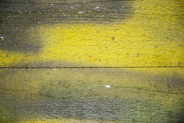 Texture of old cracked paint on wooden boards.
