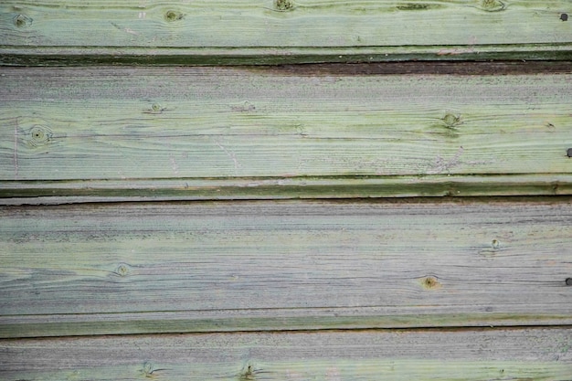 Texture of old cracked paint on wooden boards.