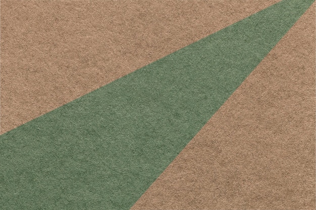 texture of old craft dark brown and green color paper background macro vintage abstract olive cardboard
