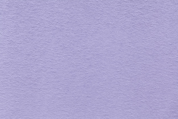 Photo texture of old light violet paper closeup