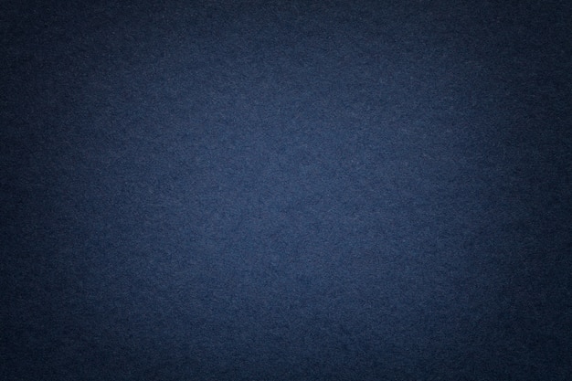 Texture of old navy blue paper background