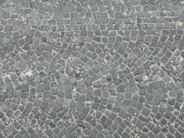 Texture of an old stone road top view