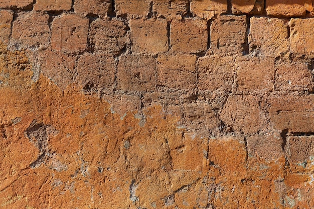 Texture of old stone wall in brown color