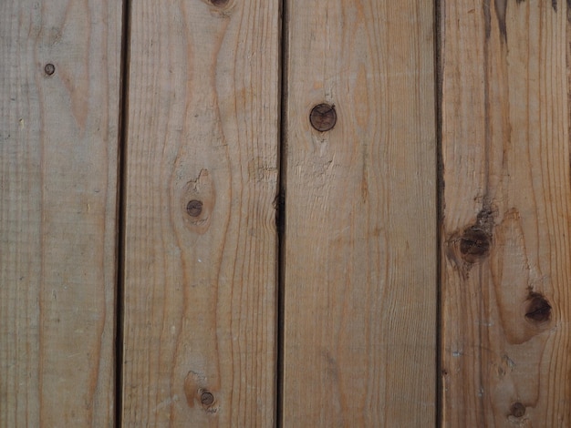 Текстура старой древесины Крупный план пня Глубокие трещины в деревянной поверхности ходы насекомых ветхость деревянных конструкций Воздействие ветра и воды на древесину