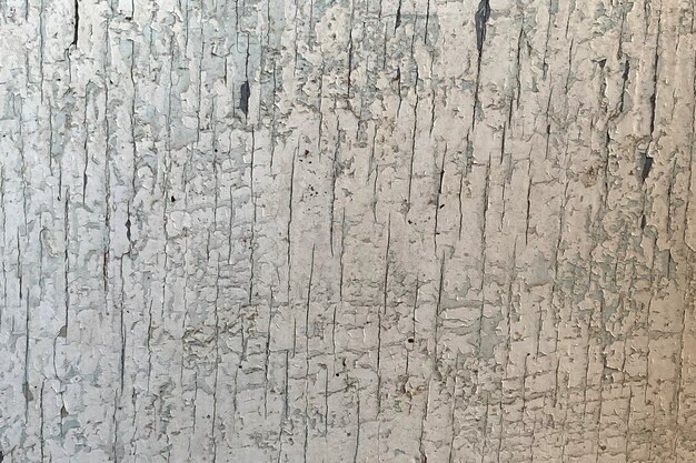 Texture of old wooden wall with cracking white paint