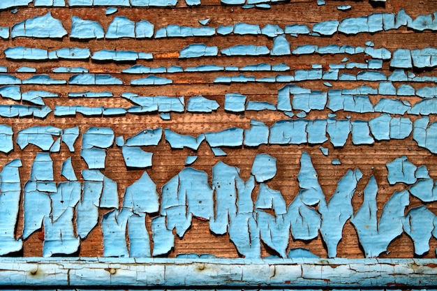 Foto texture di un vecchio muro di legno con sfondo astratto di vernice blu pelati.