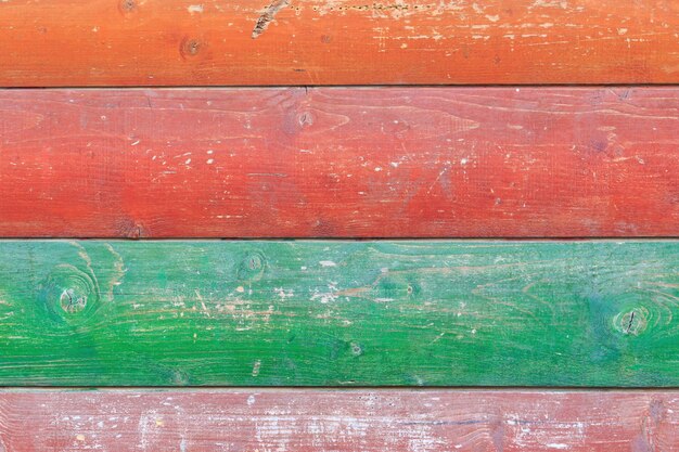 Texture of painted in different colors wooden boards