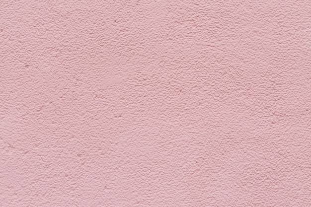 Texture of pink cement concrete wall background