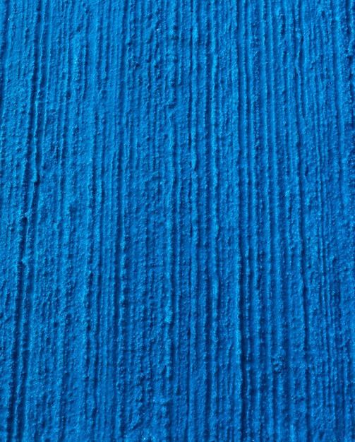 파란색 개념 배경으로 칠해진 회반죽 벽의 질감