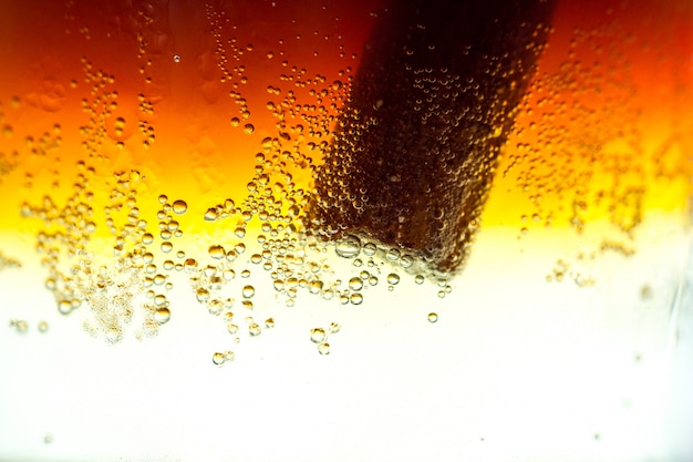 Texture of refreshing, cold cocktail with soda bubbles. Cold and carbonated drinks