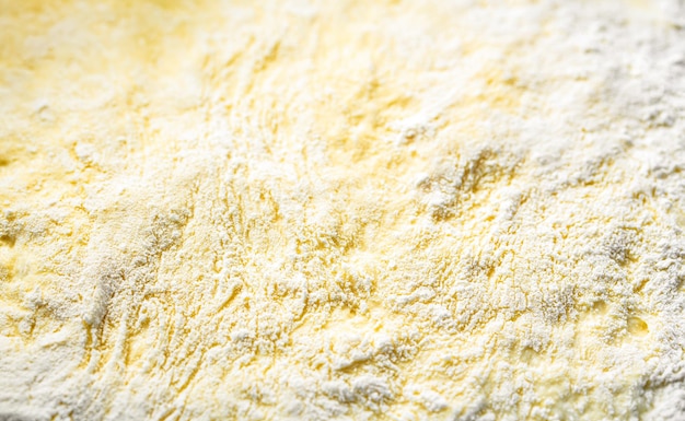 Texture of rolled dough Background of the dough for baking Fresh raw dough for pizza