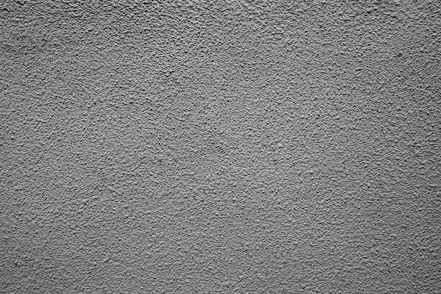 A texture of rough gray plaster with a rough texture background