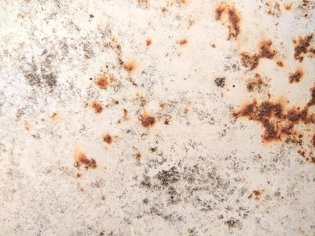 Photo texture of rusty iron sheet surface rust cracked surface abstract background