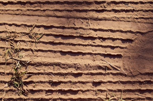 The texture of the sand is made by the grass