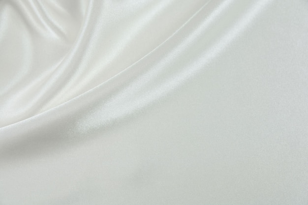 Photo the texture of the satin fabric of white color for the background