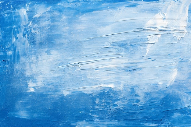 Photo texture shot of blue paint strokes on a canvas against a blue background