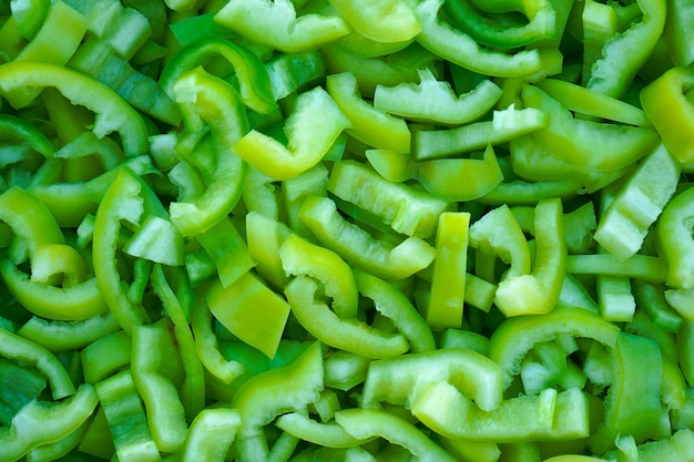 Photo texture slices of chopped green bell pepper