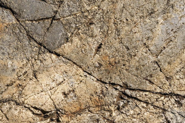 Texture of stone rock Cracks in stone surface