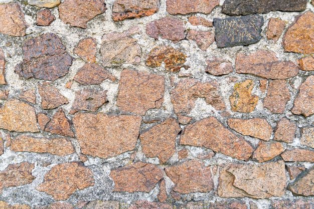 Texture of a stone wall. Old castle stone wall texture background.