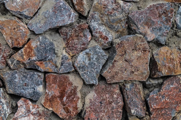 The texture of the stone wall.Part of the stone wall for the background.