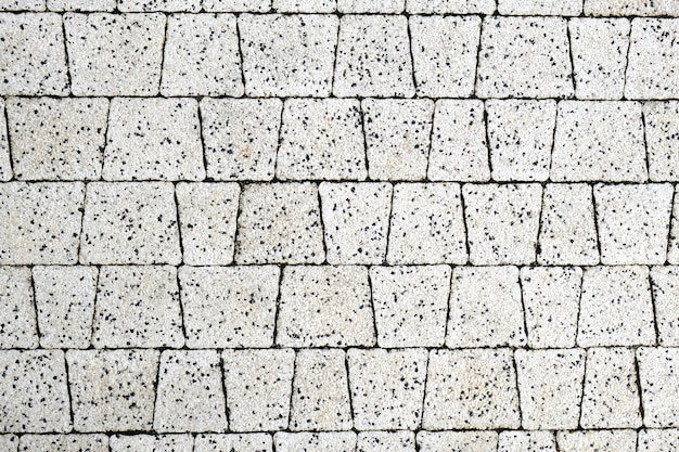 Texture of tiles of modern Pavement close-up. Abstract wall Background.