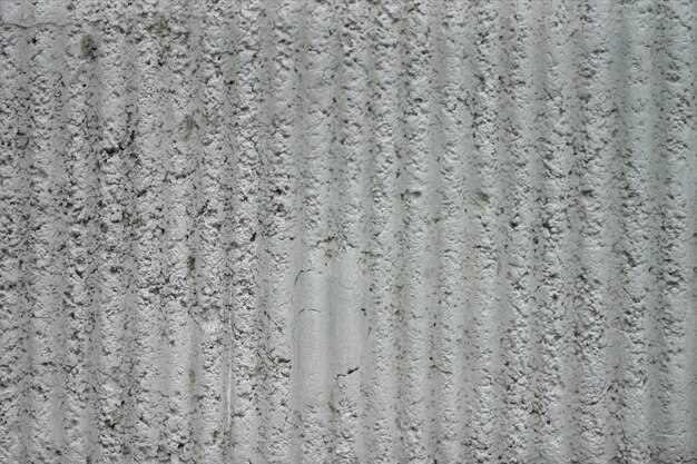 Texture of uneven plaster.