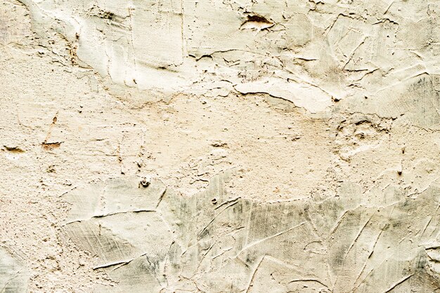 Texture wall concrete background. Wall fragment with scratches and cracks