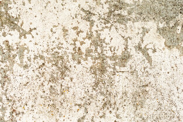 Texture, wall, concrete background. Wall fragment with scratches and cracks