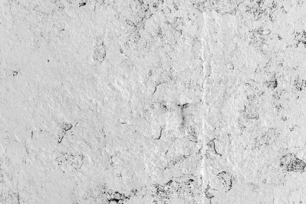 Texture, wall, concrete background. Wall fragment with scratches and cracks