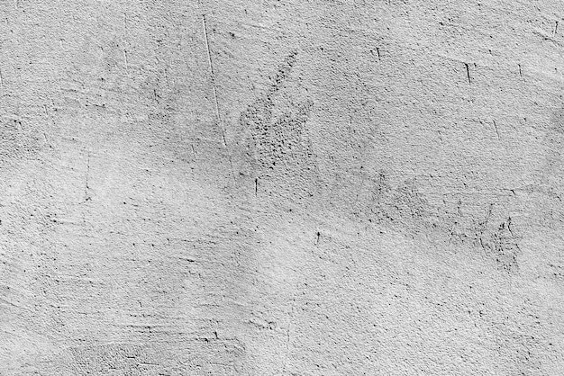 Texture, wall, concrete background. Wall fragment with scratches and cracks