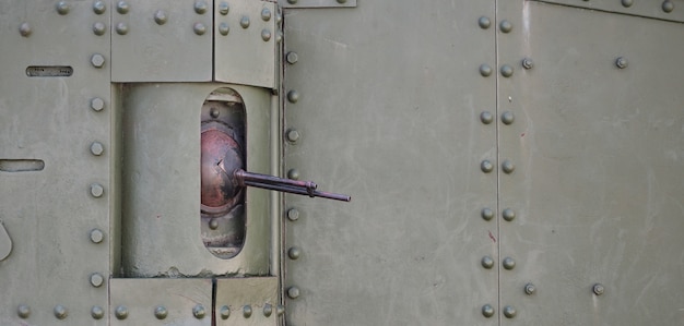 The texture of the wall of the tank, made of metal and reinforced ine gun