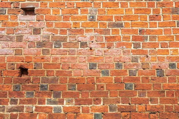 The texture of the walls of redclay bricks