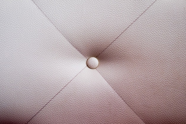 Texture of white leather furniture with button