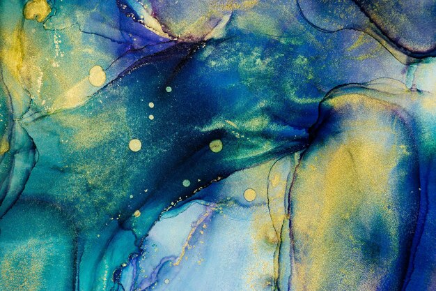 texture with gold painting made in the technique of alcohol ink