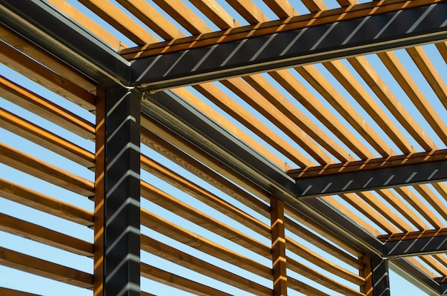 Texture of wooden lattice wall and roof parallel boards Abstract urban geometric perspective