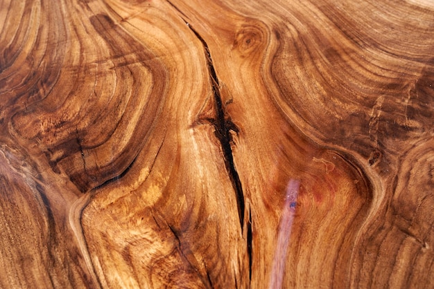 Texture of a wooden table with epoxy resin