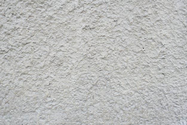 Textured background old white concrete wall