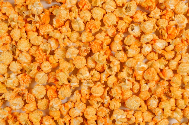 Textured backround of a popcorn isolated on white