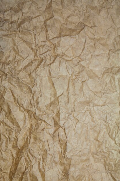 Textured brown paper background.